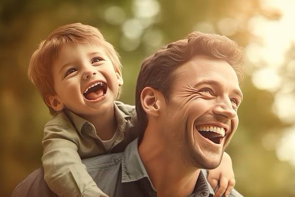 a-father-and-son-smiling-and-holding-each-other_398492-7920.jpg